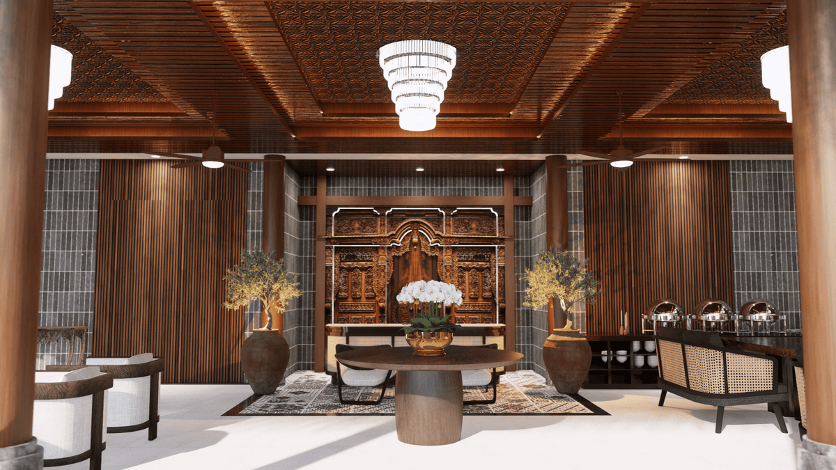 Elegant dining hall with carved wooden wall, chandelier, Balinese decor, and buffet warmers, perfect for villa guests.