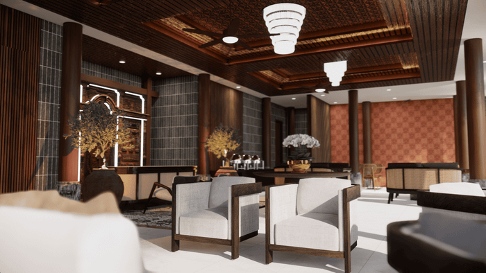 A luxurious reception lounge featuring traditional Balinese decor, comfortable armchairs, and intricate wooden ceiling details.