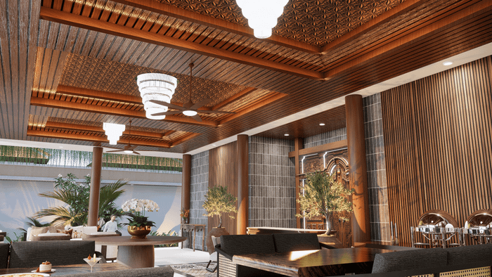 An expansive open-plan dining and lounge area featuring warm wooden ceilings, ornate lighting, and lush tropical plants.