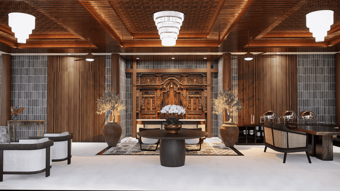 A luxurious villa interior featuring a carved wooden backdrop, modern chandeliers, and a blend of seating areas.