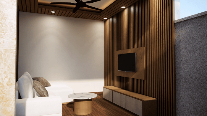 A stylish villa living room featuring a white sofa, marble coffee table, and a wooden slatted wall with a mounted TV.