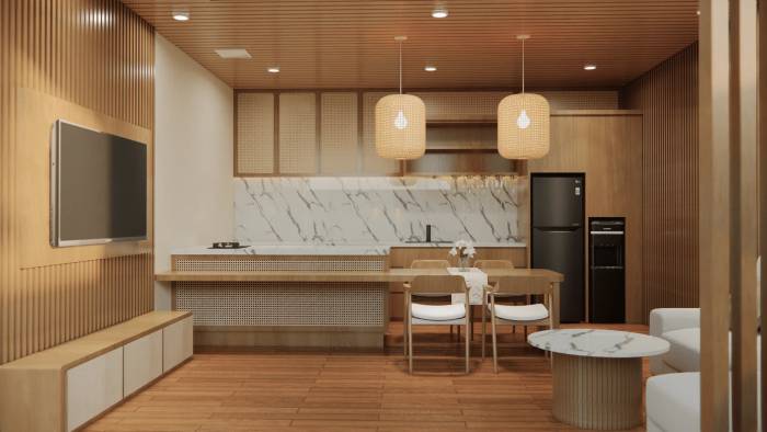 A modern open-plan villa interior with wood accents, a kitchen with marble backsplash, dining area, and a cozy living space.