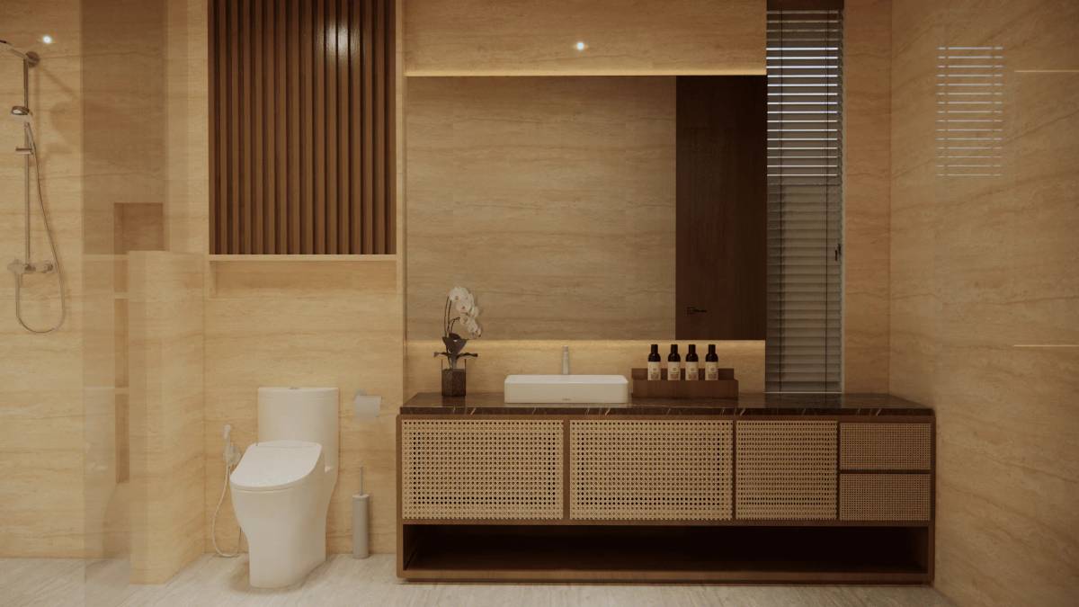 A luxurious bathroom in an Ubud villa, featuring light marble walls, a modern vanity with rattan details, and a spacious shower.
